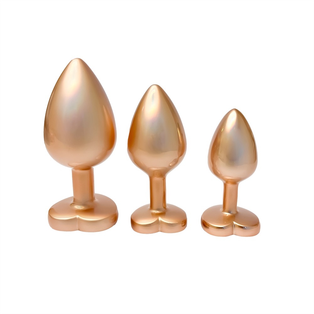 Набор из трёх анальных пробок Dream Toys Gleaming Love, размеры S, M, L, перламутрово-золотые