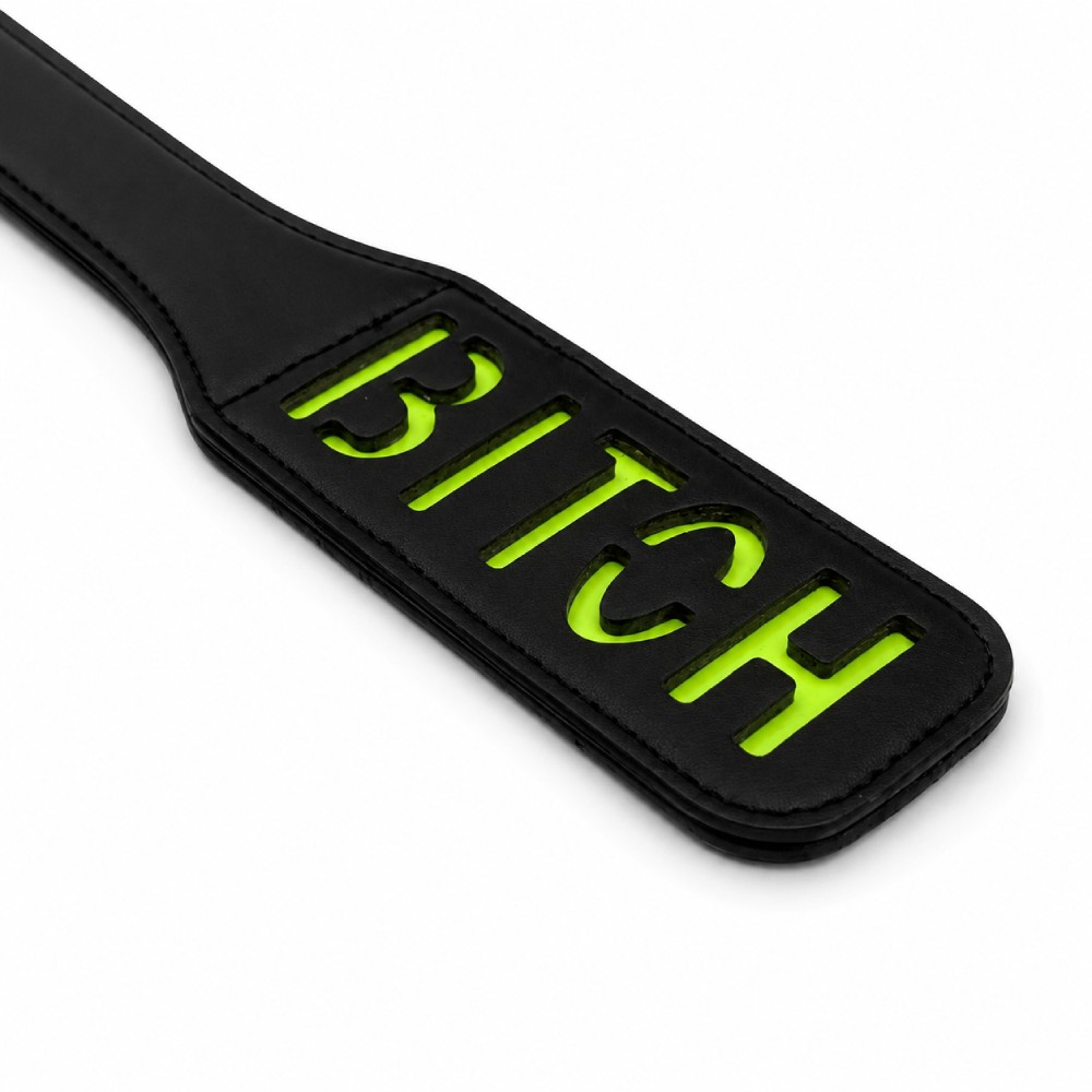 Паддл DS Fetish з люмінісцентним надписом "Bitch", чорний